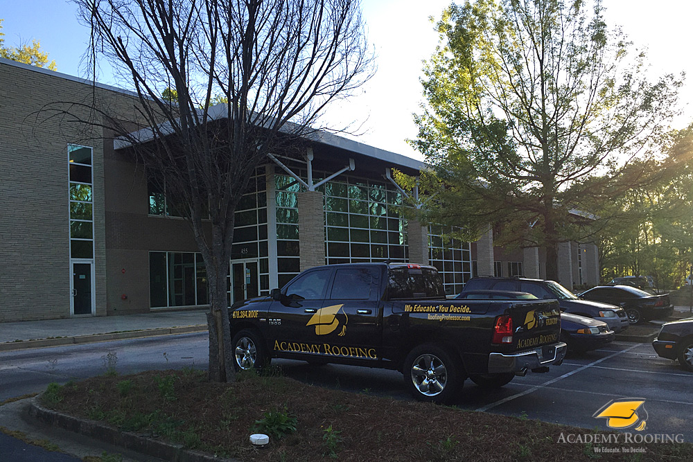 commercial-roofing-3 Completed flat roof project with mechanical units