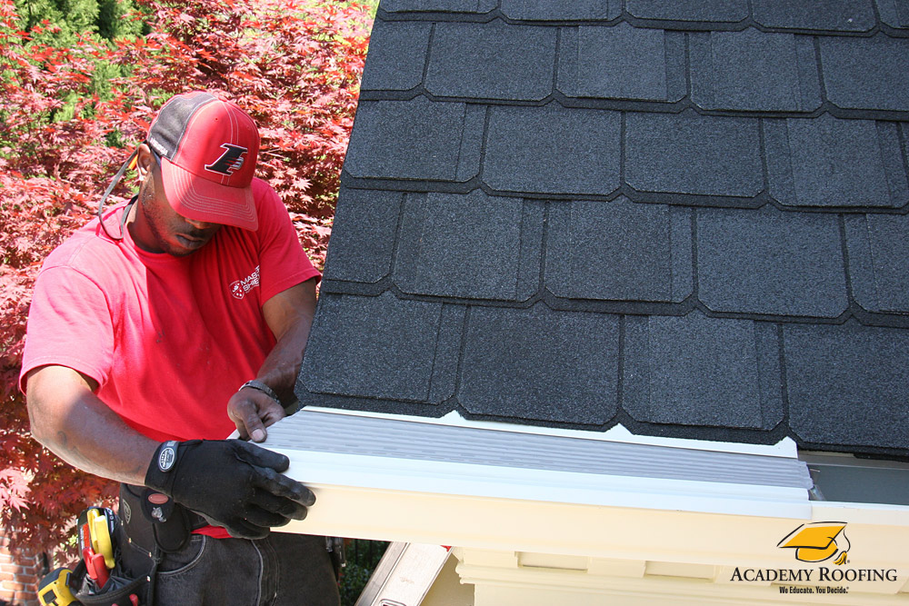 gutters-atlanta-2 Academy Roofing team installing Senox gutter system