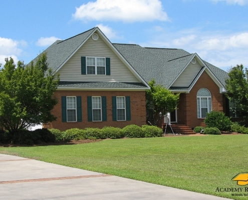 Single-family Georgian-style home featuring GAF Timberline roofing