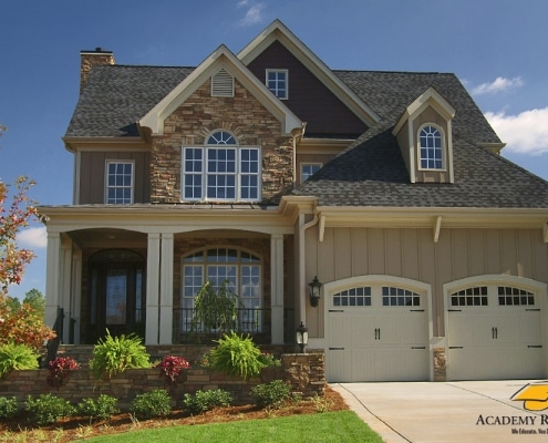 Two-story house with synthetic slate roof and ridge vent in Georgia