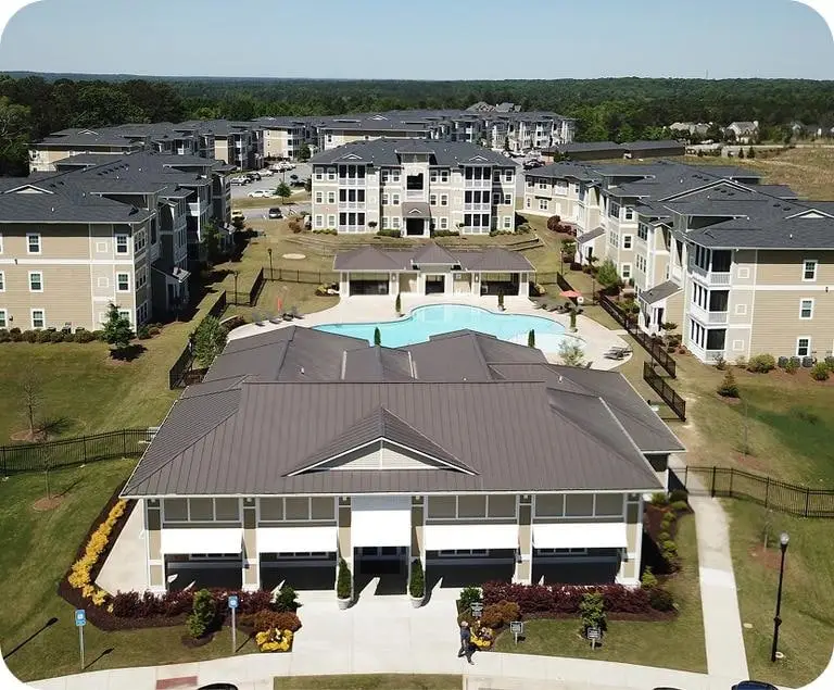 Aerial view of completed multifamily roofing project after final cleanup and close-out