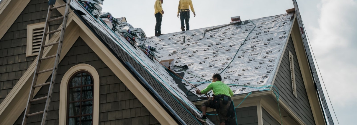 Academy Roofing crew working on a residential roof in Acworth, GA