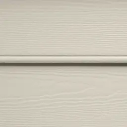 Hardie® Plank Beaded Select Cedarmill® lap siding featuring woodgrain texture and a decorative beaded edge.